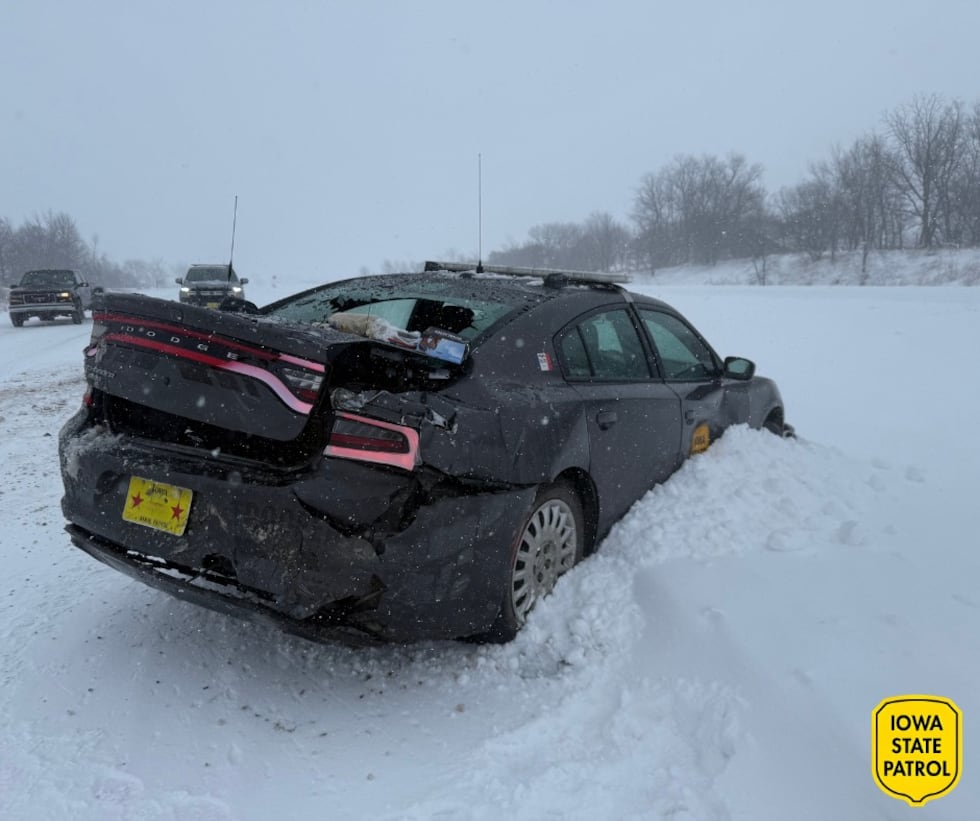 ISP said a patrol car was hit while assisting stranded moterists