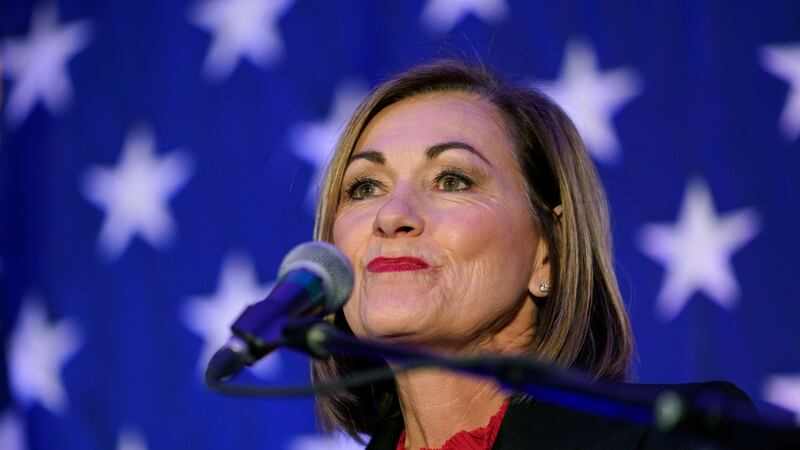 FILE - Iowa Gov. Kim Reynolds speaks to supporters during a Republican Party of Iowa election...