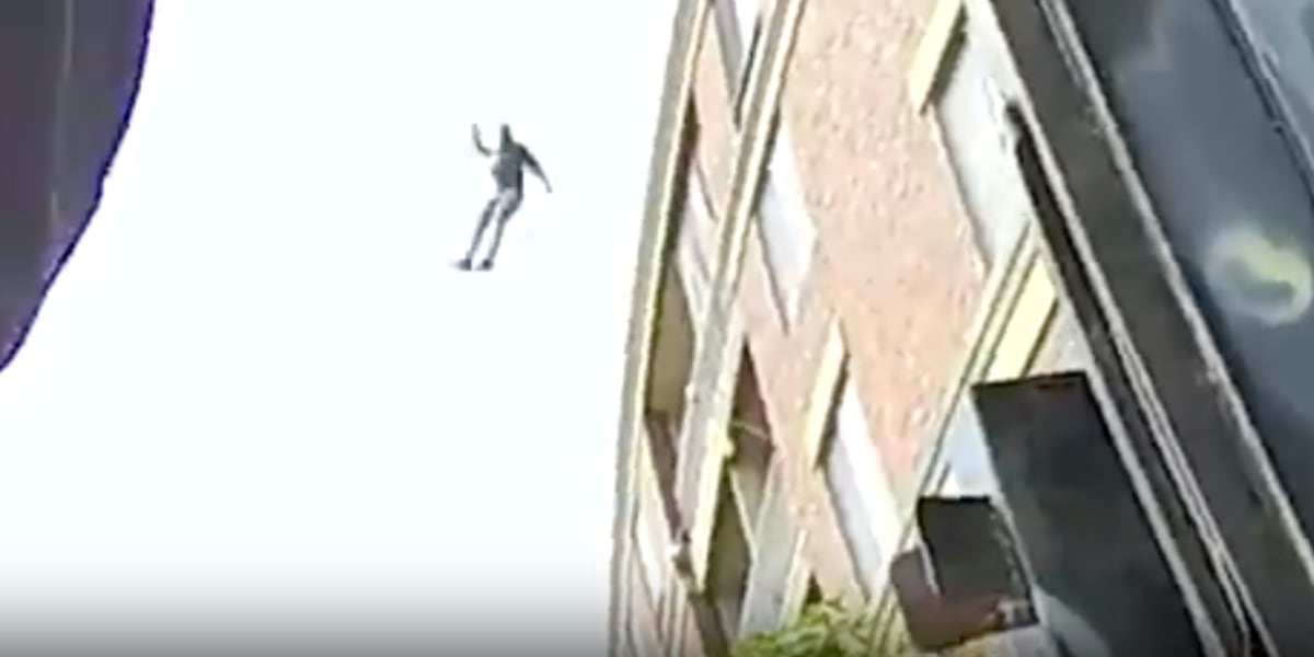 GRAPHIC Robbery suspect makes massive jump off building in attempt to