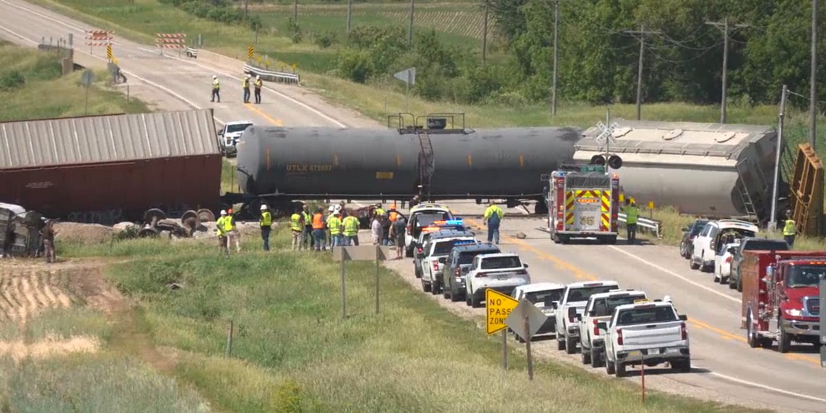 Road reopened after fatal train crash and derailment