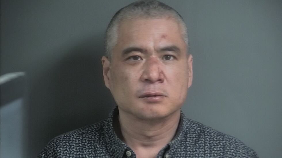 Johnathan Kim, of Iowa City, is facing charges after police say he punched and kicked an...