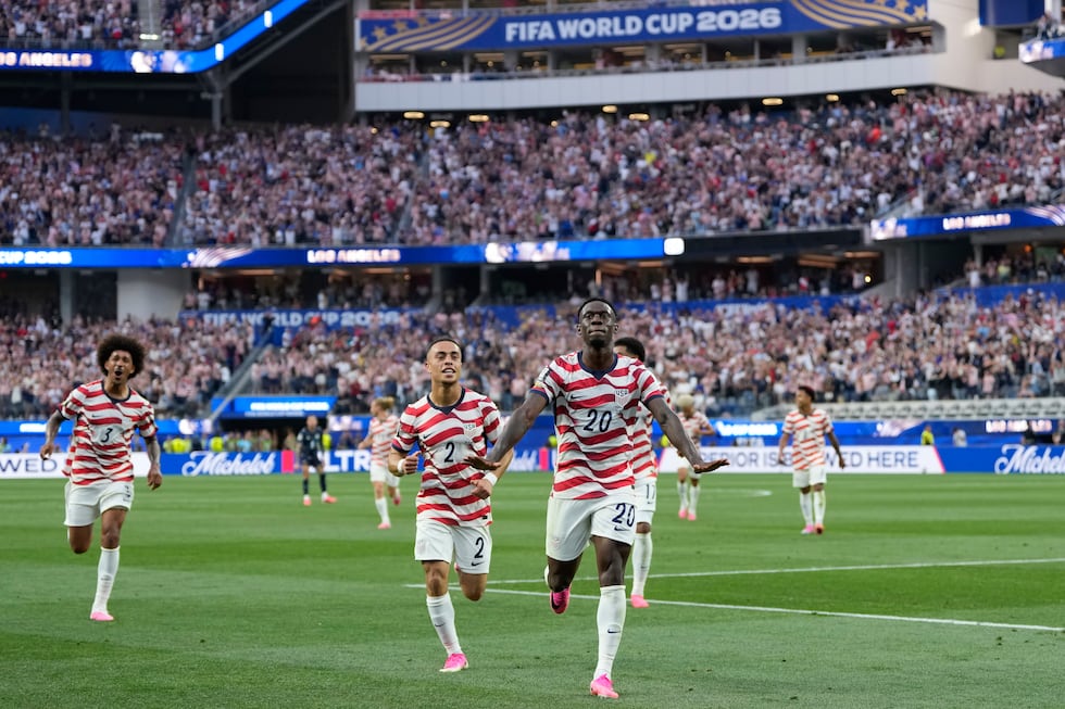 US national team reaches round of 32 at the World Cup after beating Australia 2-0 1 United States' Folarin Balogun (20) celebrates scoring his side's third goal against Paraguay...