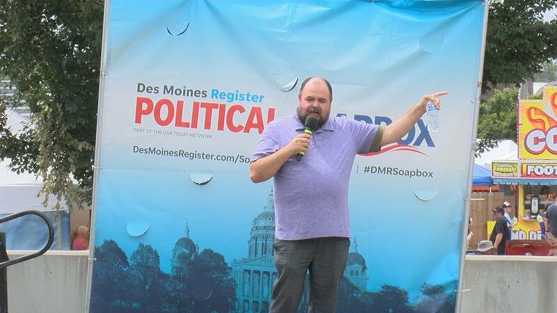 Ryan Melton, Iowa 4th District Congressional candidate, speaks Sunday during the Iowa State Fair.