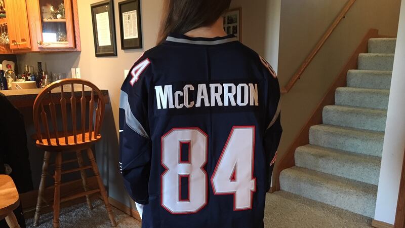 Maddie McCarron sports her Patriots jersey with her brother Riley's name and number on...