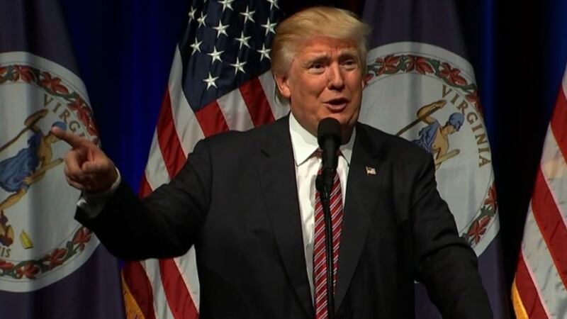GOP presidential nominee Donald Trump asks an audience member at a rally to take their crying...