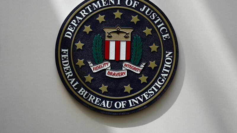 FILE - An FBI seal is seen on a wall on Aug. 10, 2022, in Omaha, Neb.