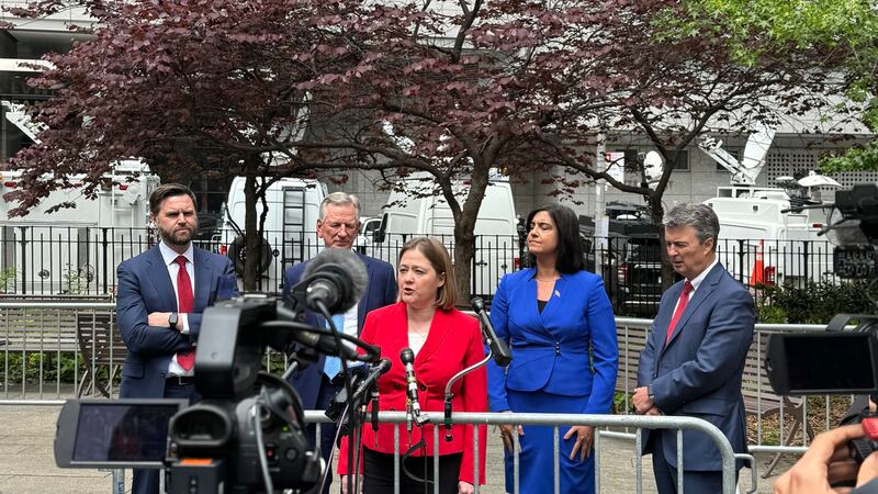 Iowa Attorney General Brenna Bird campaigned for former president Donald Trump outside his...