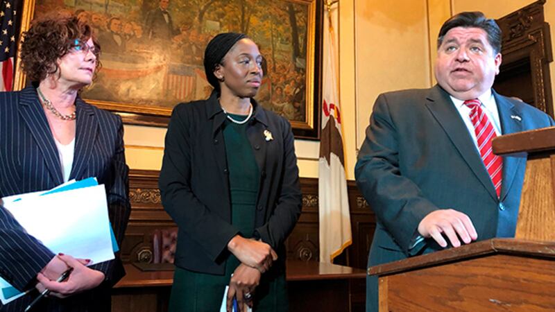 Illinois Emergency Management Agency Director Alicia Tate-Nadeau, left, and Dr. Ngozi Ezike,...