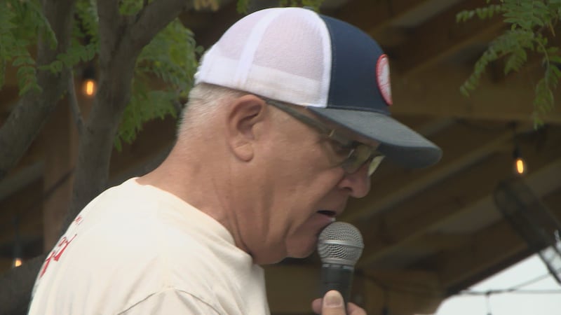 Iowa track announcer Mike Jay uses voice to fundraise shoes, cancer research