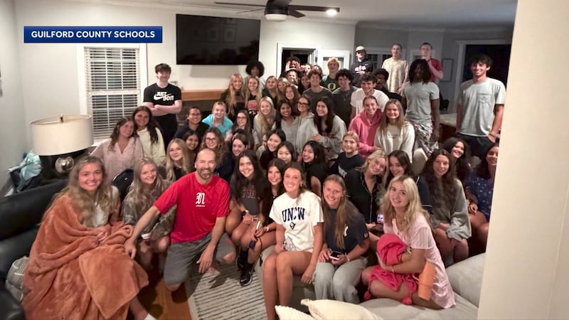 Around 56 Northwest Guilford High School seniors showed up at the home of their principal, Dr....
