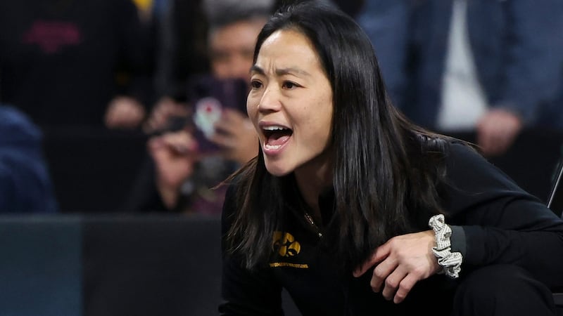 Iowa head women's wrestling coach Clarissa Chun signed a contract extension, scheduled to keep...