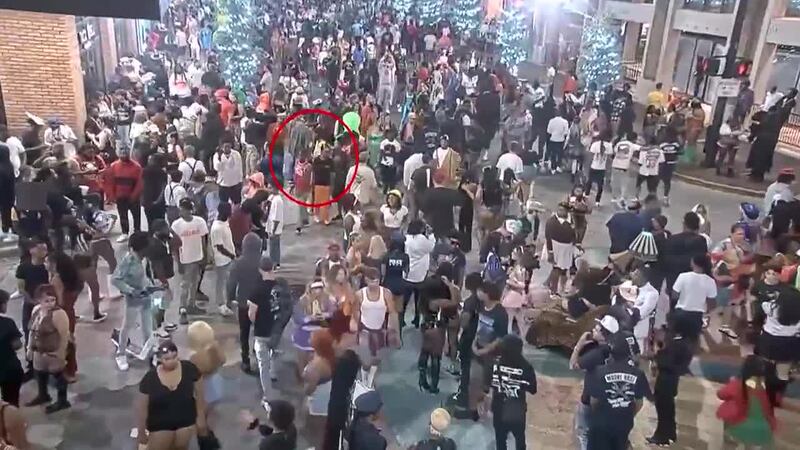 Video shows the moments gunfire rang out as thousands celebrated Halloween, killing at least...